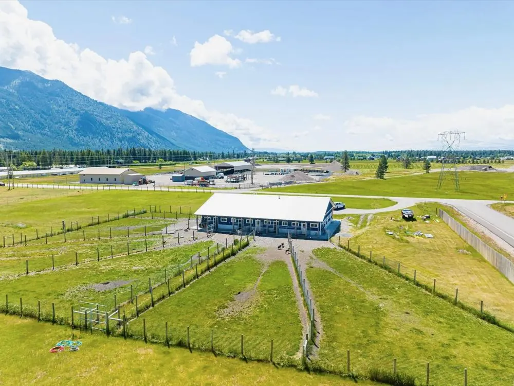 The ranch seen from above, showing the building, the yards and the road in.
